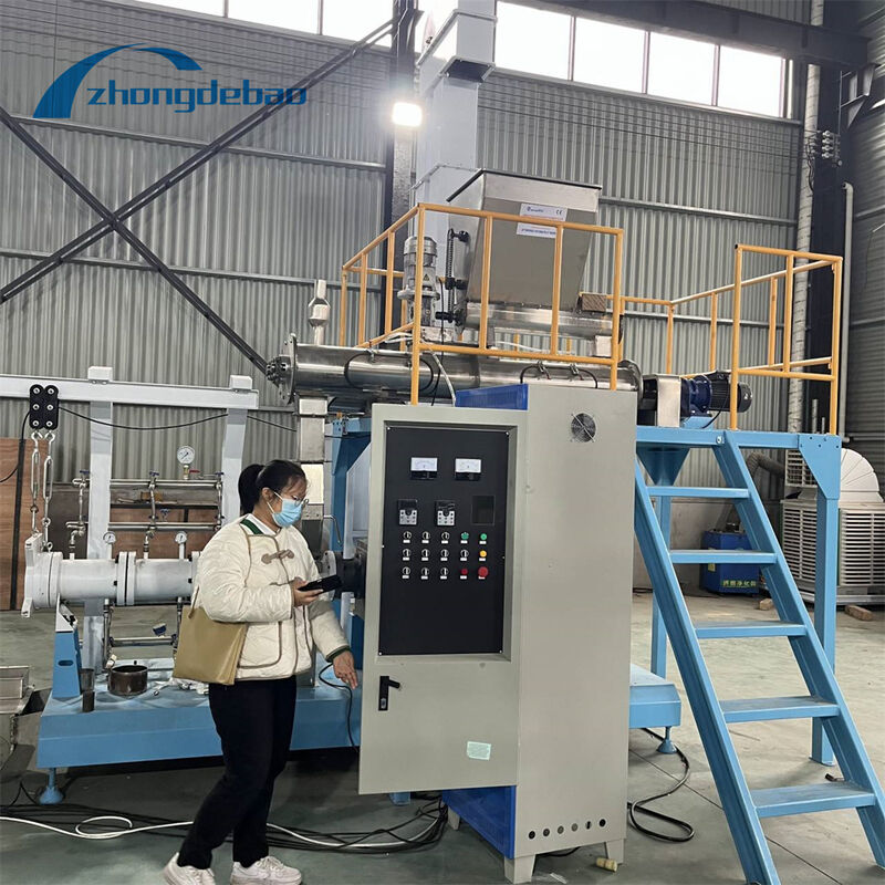 الطاقة الرئيسية 37-160kw آلة تغذية الأسماك العائمة الصناعية الصف آلة تغذية تخريزية عائمة لمرافق تربية الأسماك