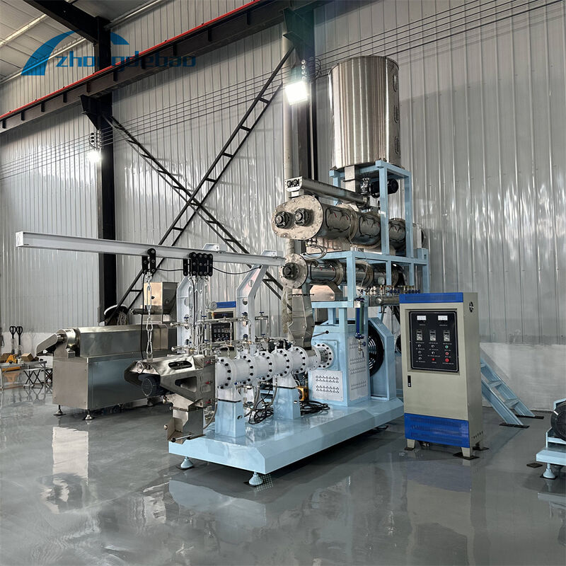الطاقة الرئيسية 37-160kw آلة تغذية الأسماك العائمة الصناعية الصف آلة تغذية تخريزية عائمة لمرافق تربية الأسماك